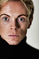 Blond man wearing a polo neck
